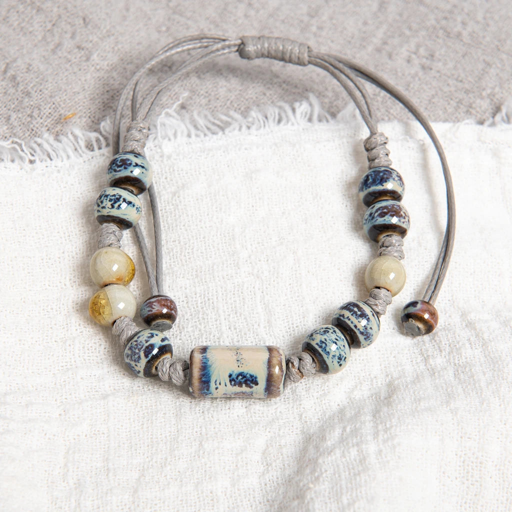 Bracelet with ceramic beads on a textured surface