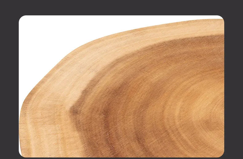 Wooden cutting board with a natural grain pattern on a white background