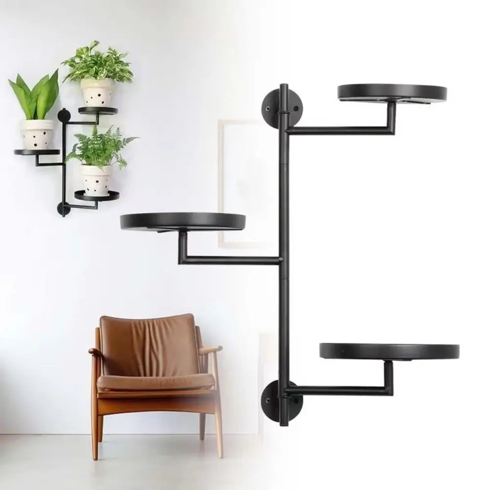 Black wall-mounted shelf with plants and a brown chair on a white background