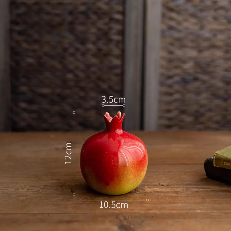 Pomegranate on a wooden surface with measurements indicated