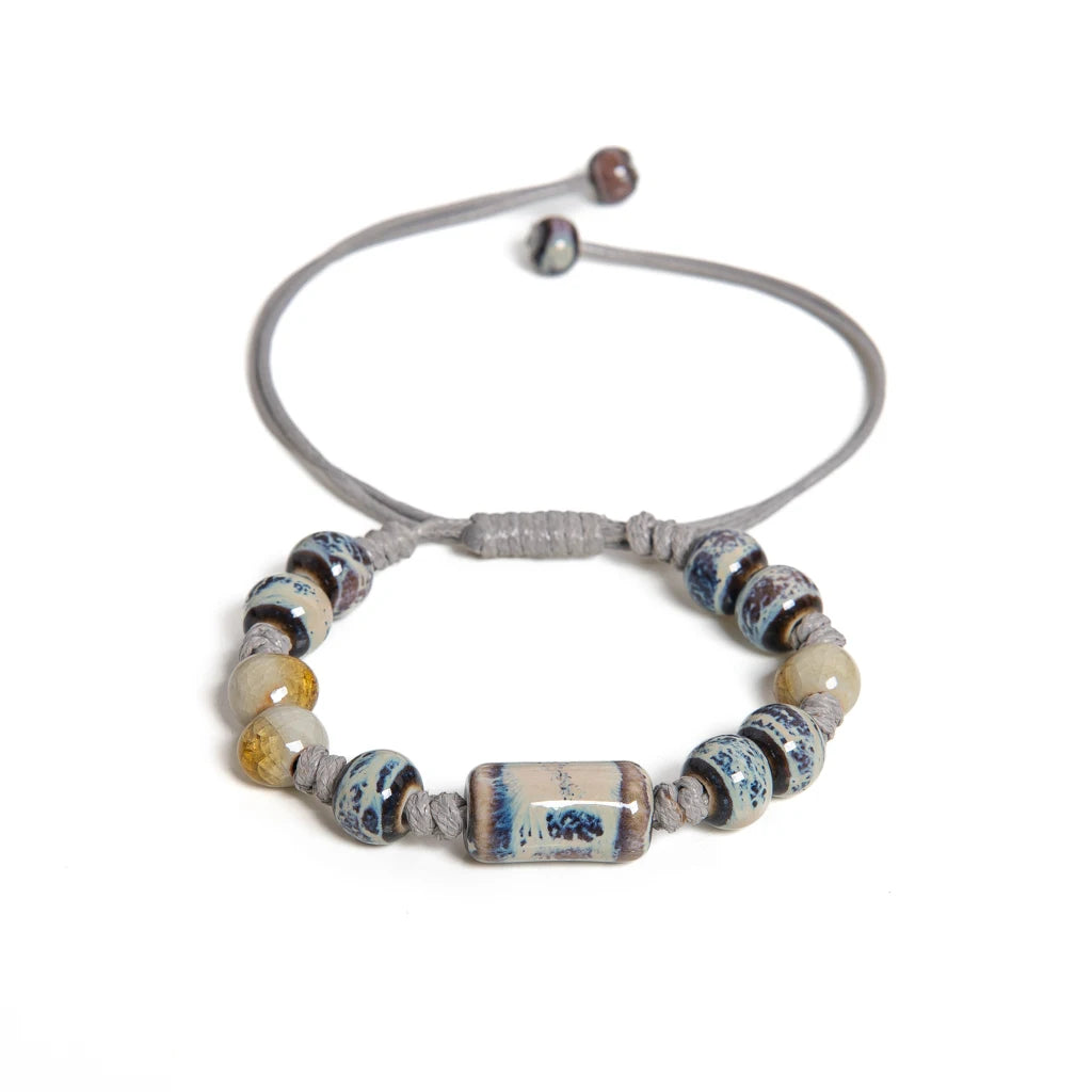 Beaded bracelet with ceramic beads on a white background