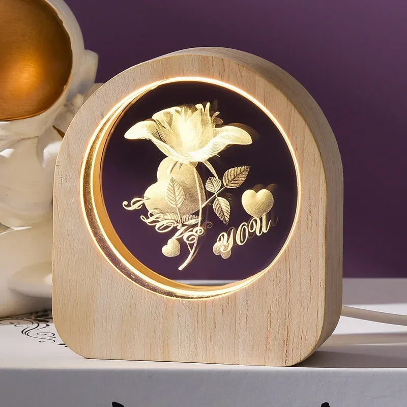 Decorative light with floral design and 'I love you' text on a wooden base.