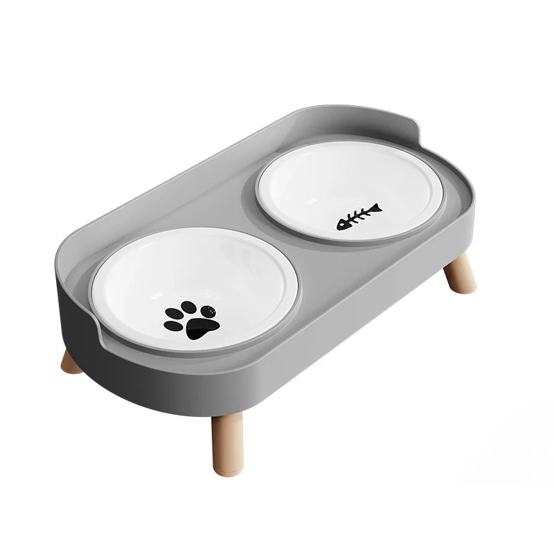 Pet food bowl with two white bowls on a gray stand with wooden legs on a white background