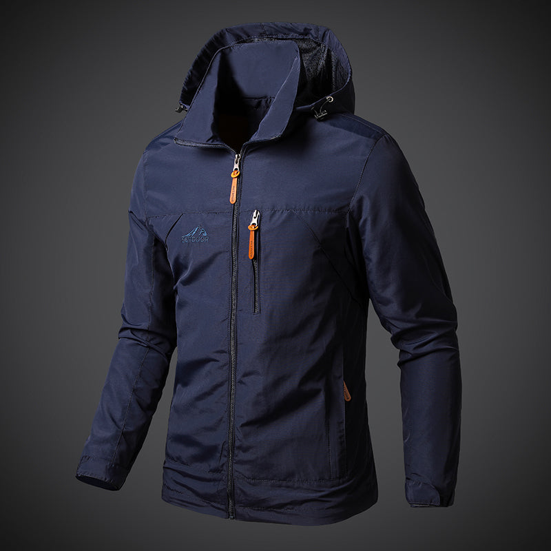 Navy blue jacket with orange zipper on a gray background