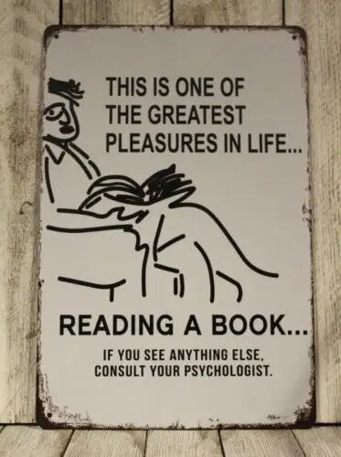 Vintage-style metal sign with humorous “Reading a Book” quote and simple line illustration.