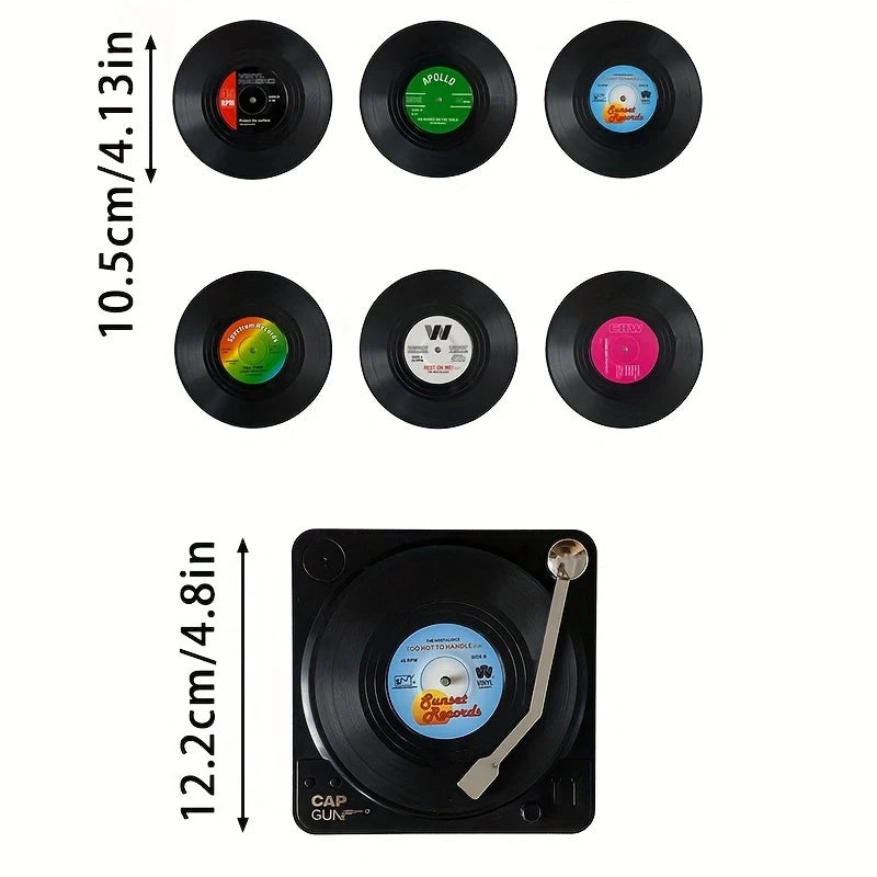 Set of vinyl record coasters with dimensions and a small record player model on a white background