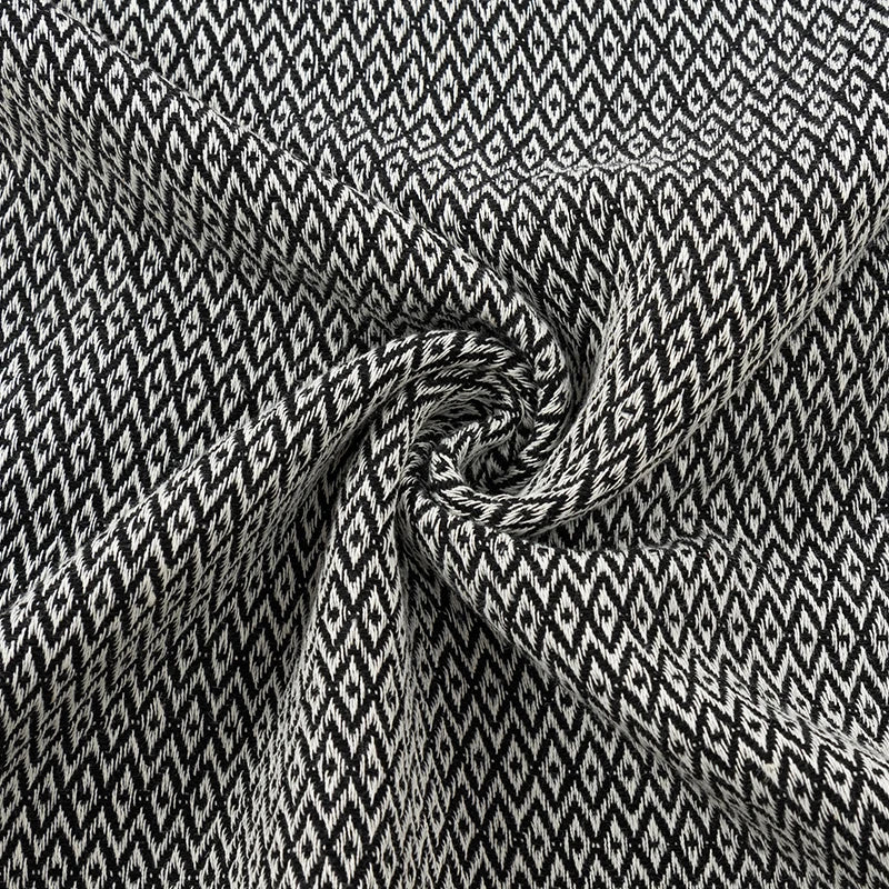 Black and white patterned fabric with a swirl for a throw