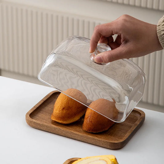 Glass pastry display dome with bamboo serving base