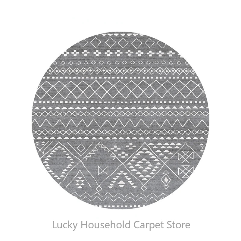 Round gray and white patterned rug  branding.