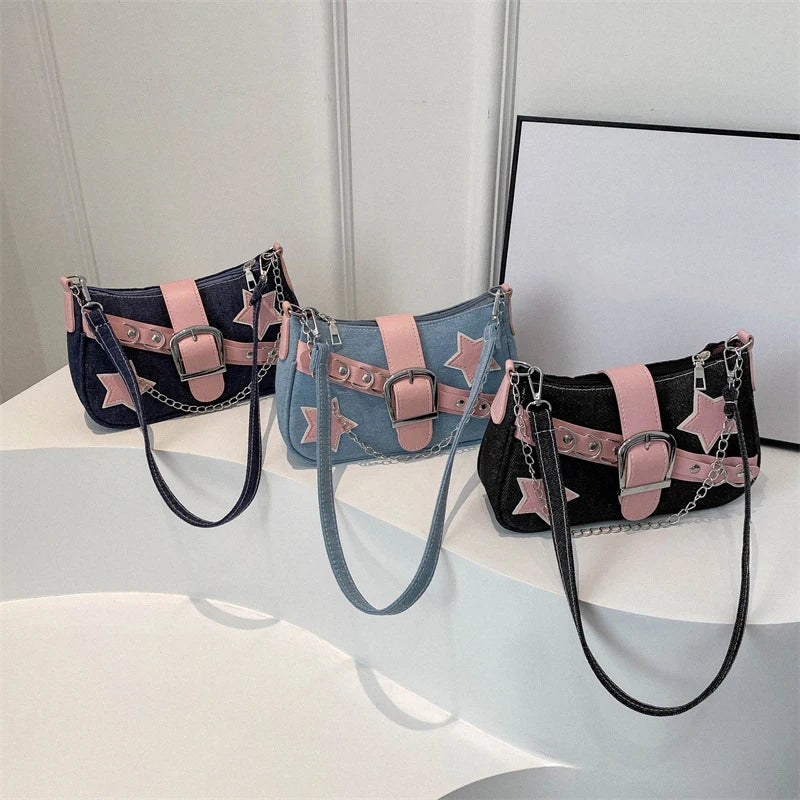 Three handbags with star and buckle designs on a white surface.