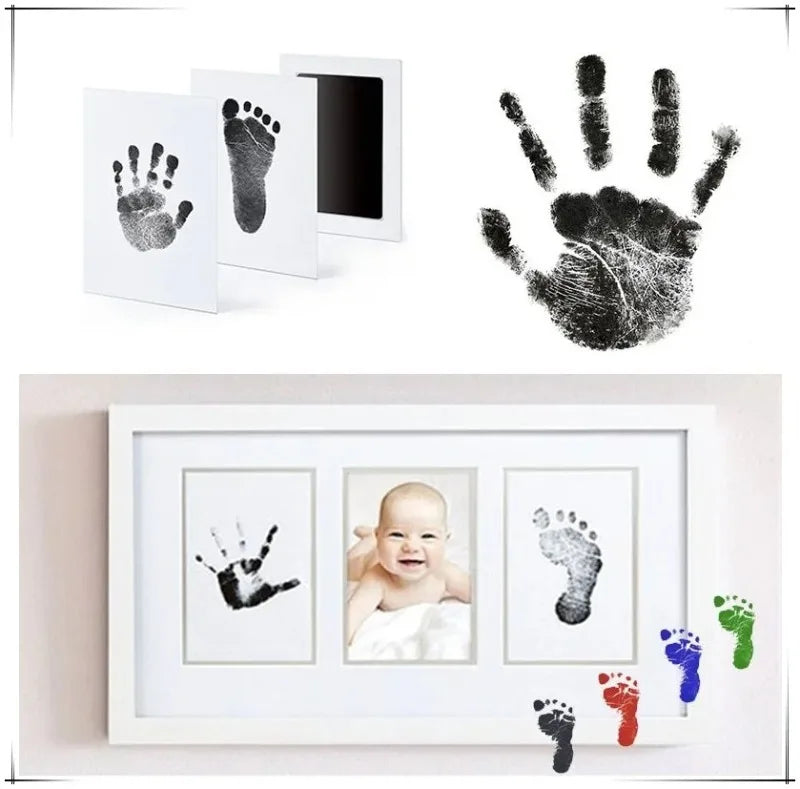 Baby hand and foot print kit with ink pads and photo frame on a white background