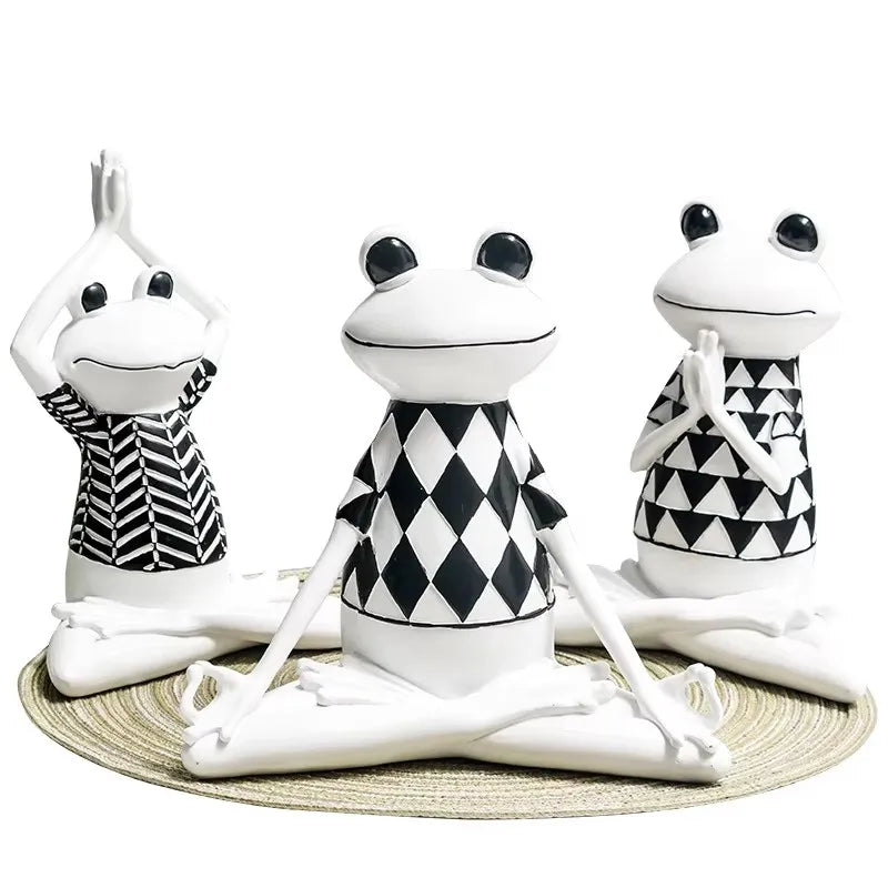 Black and white yoga frog resin ornament sitting in meditation pose for modern shelf and home decor