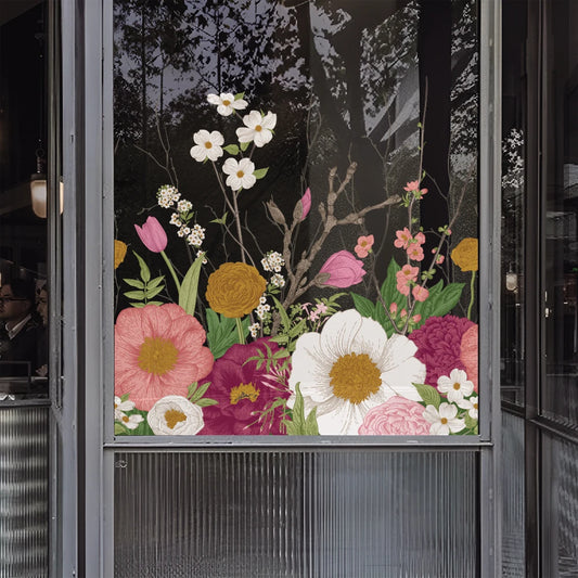 Decorative glass panel with colorful floral design on a dark background