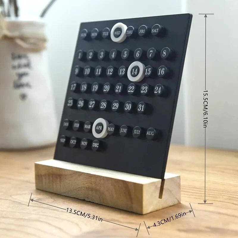 Black calendar on a wooden stand with measurements indicated