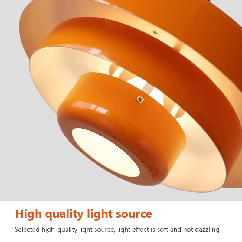 Orange ceiling light fixture on a gray background with text about high-quality light source.