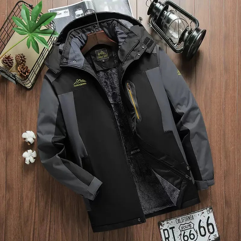 Black jacket on a wooden surface with decorative items around