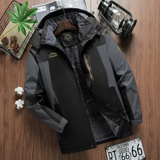 Black jacket on a wooden surface with decorative items around