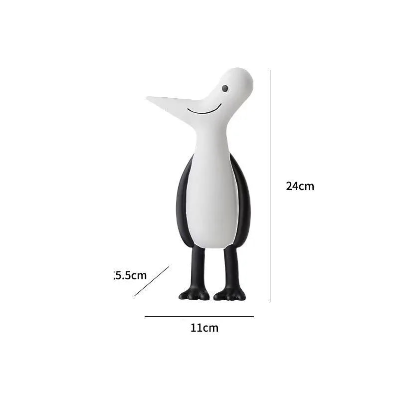 Black and white bird-shaped figurine with dimensions on a white background