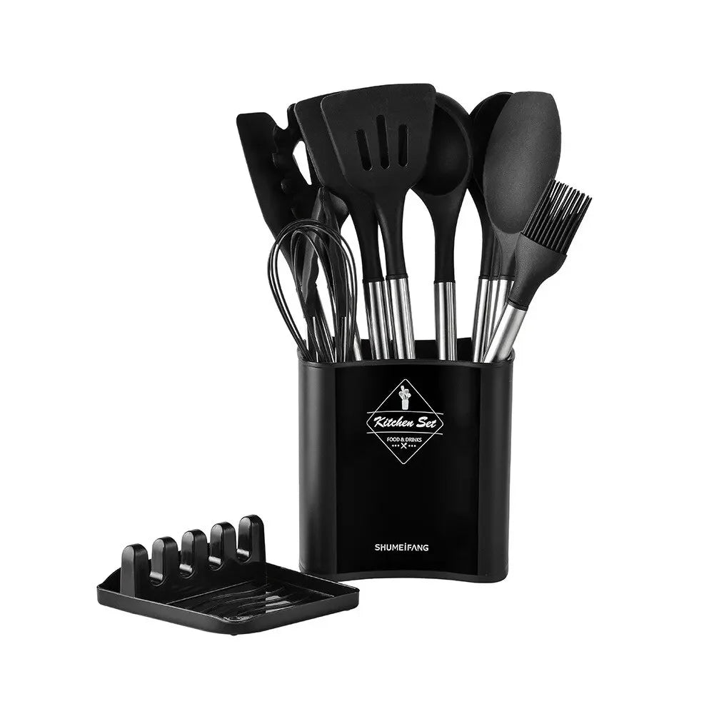 Black kitchen utensil set with holder on a white background