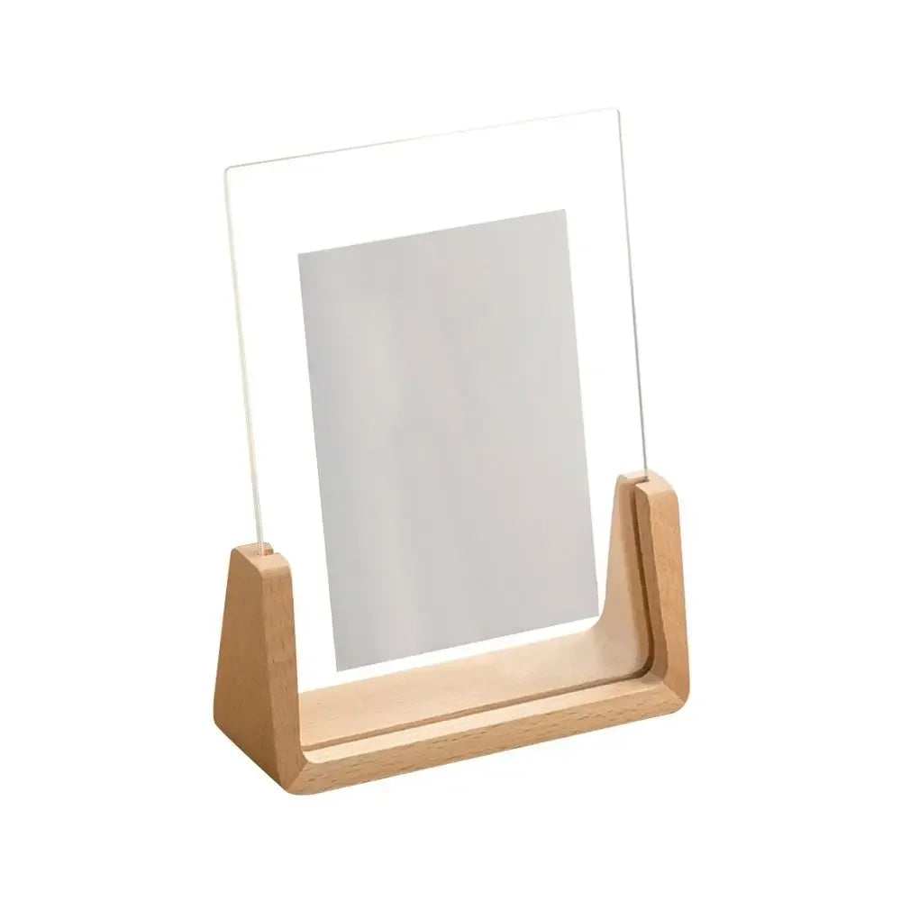 Wooden photo frame with a clear glass cover on a white background