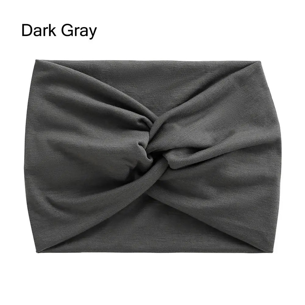 Dark gray headband with a knot on a white background