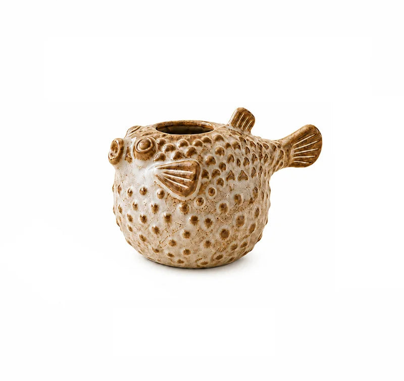 A ceramic puffer fish planter in a textured tan and brown glaze, shown on a plain white background with 'ZIZI Fish' text in the top-left corner.