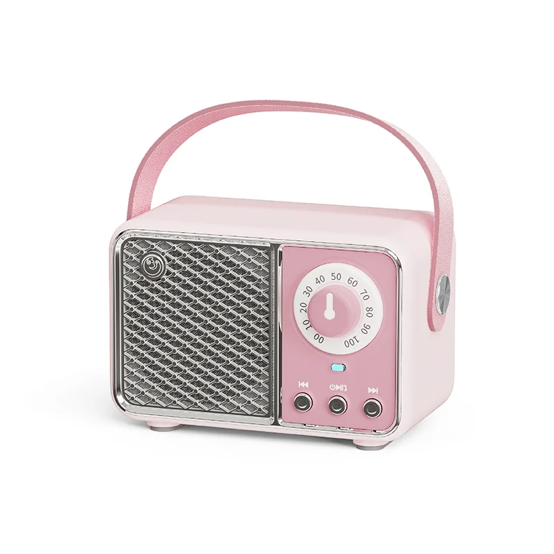 Pink vintage-style radio with a handle on a white background