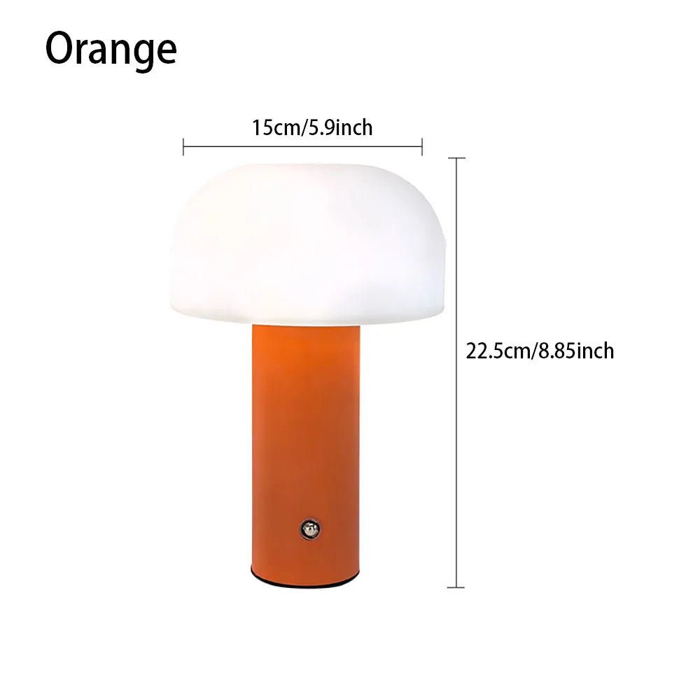 Orange table lamp with dimensions on a white background