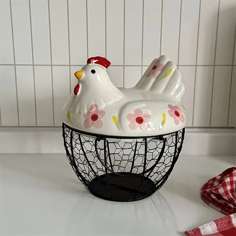 Ceramic chicken-shaped container with floral designs on a tiled kitchen counter.