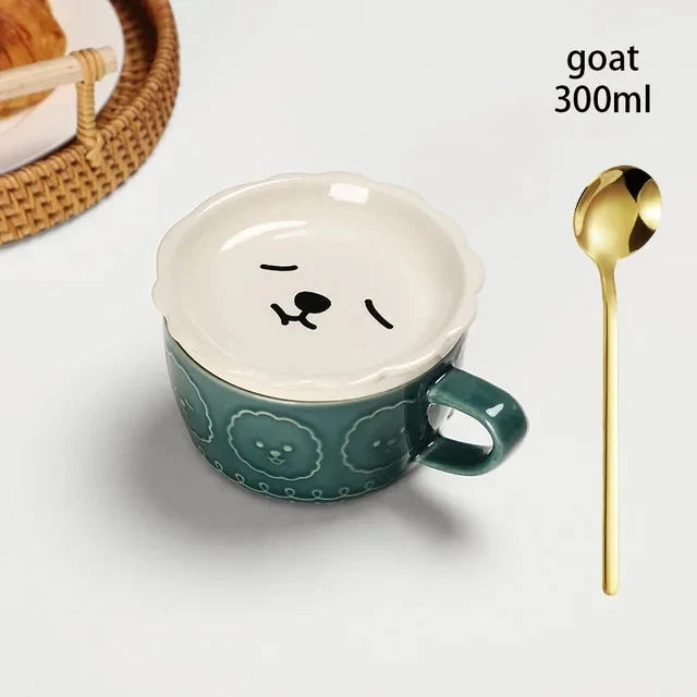 Green mug with a cartoon face, gold spoon, and text 'goat 300ml' on a white background