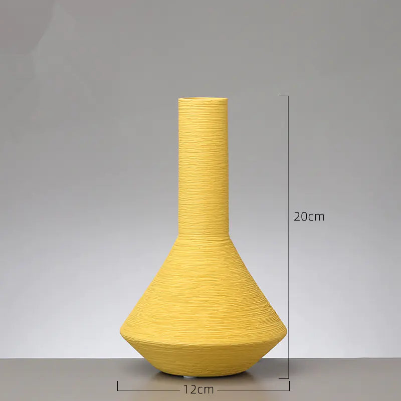 Yellow vase with dimensions on a gray background