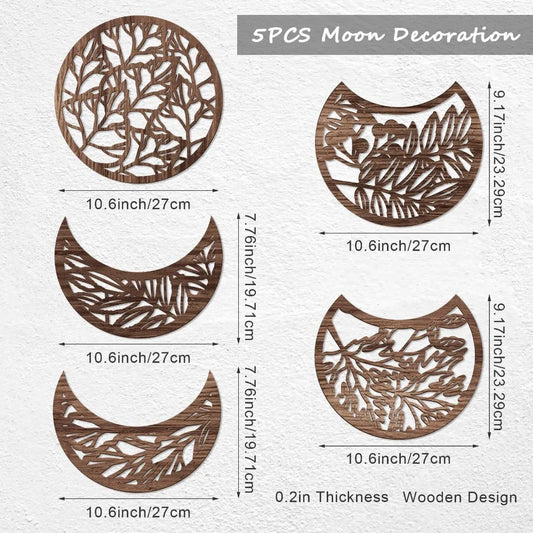 Wooden moon-shaped decorations with leaf patterns and measurements on a white background