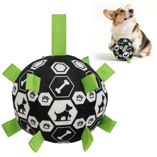 Dog toy with black and white pattern and green accents, featuring a dog holding the toy.