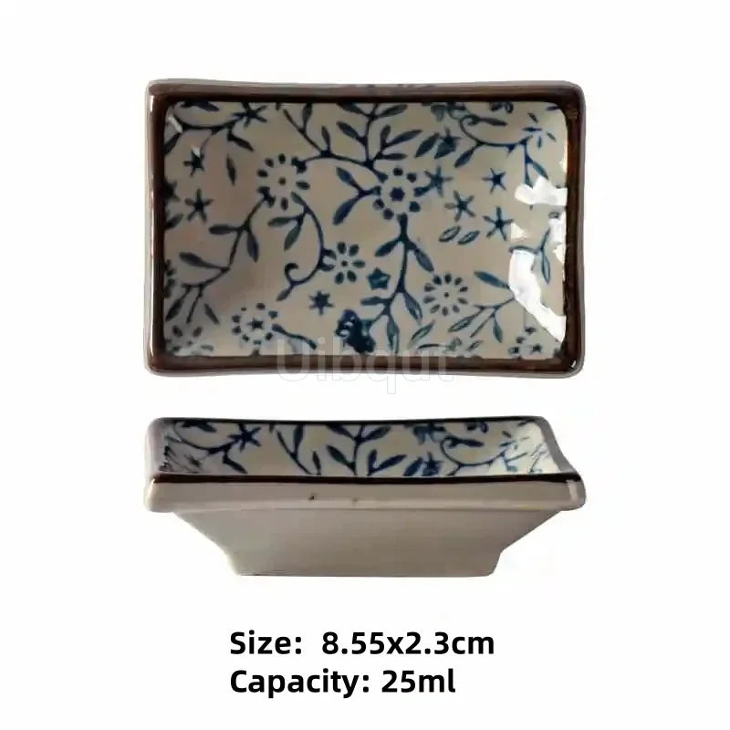 Ceramic container with blue floral pattern on a white background