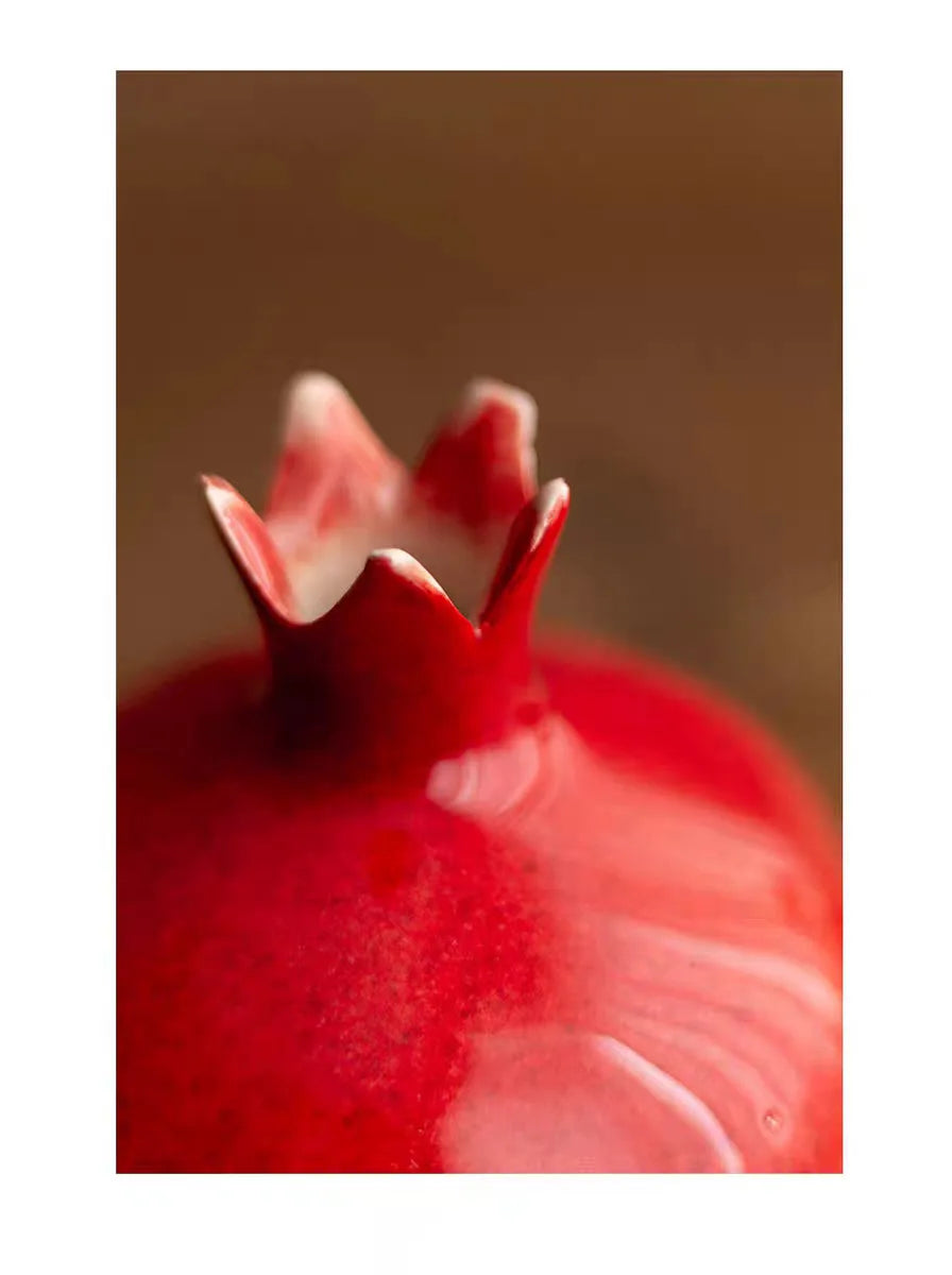 Close-up of a red flower vase with a blurred background