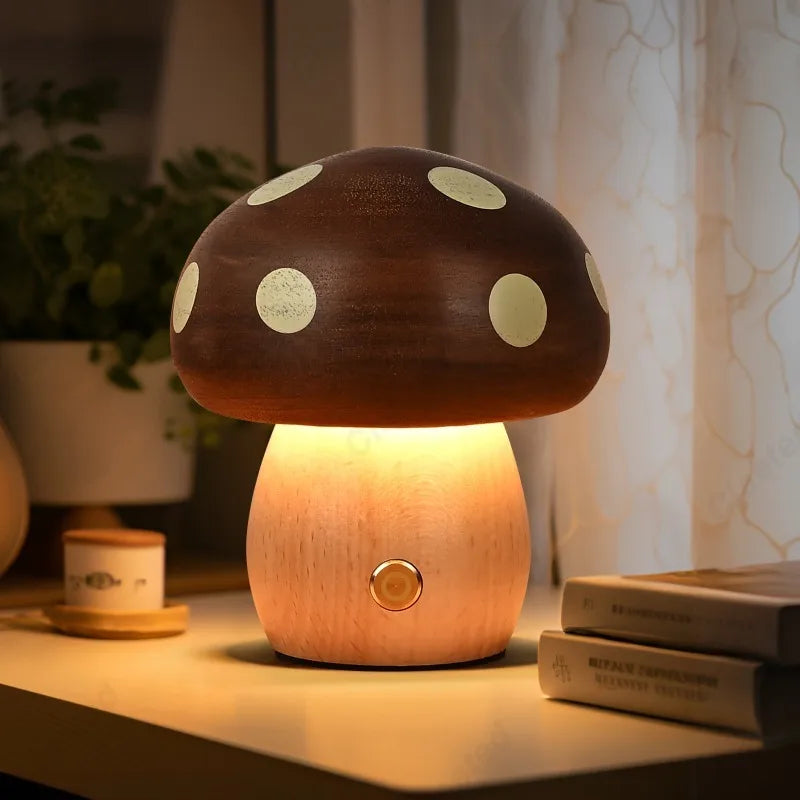 Mushroom-shaped lamp on a table with books and a plant in the background