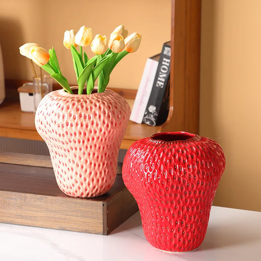 strawberry ceramic vase in red with playful fruit design for home decoration
