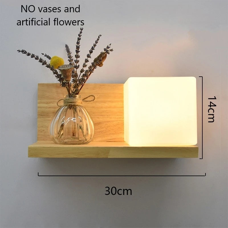 Wooden shelf with a glass vase of flowers and a square light, dimensions indicated.