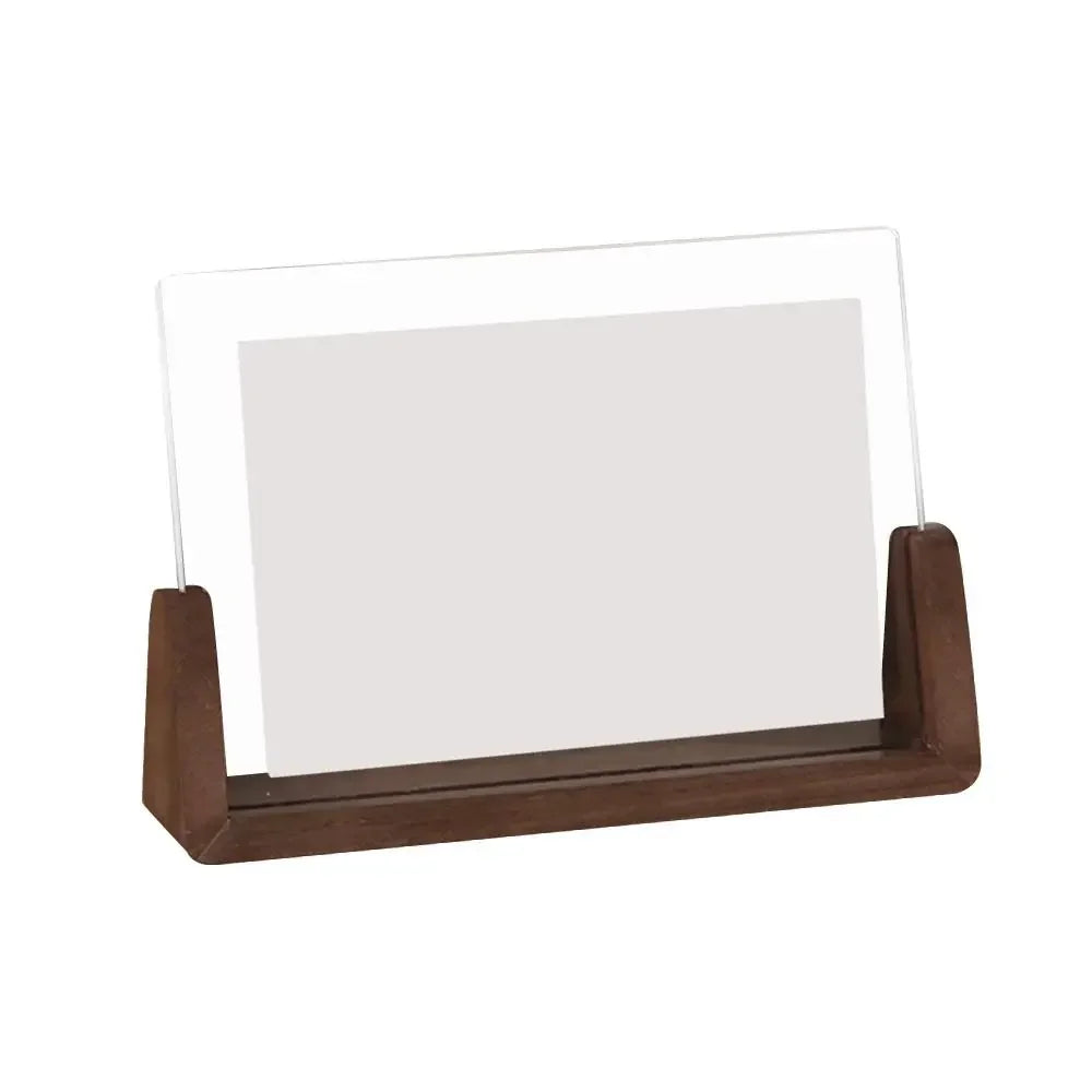 Wooden picture frame with a glass front on a white background