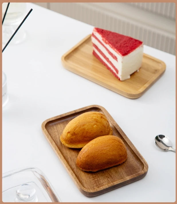 Glass pastry display dome with bamboo serving base