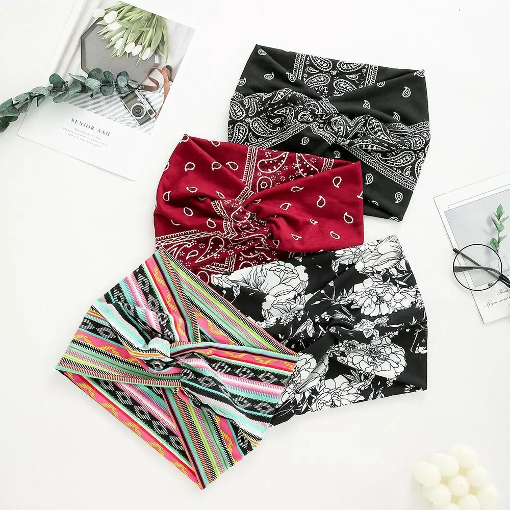 Set of colorful headbands with various patterns on a white surface.