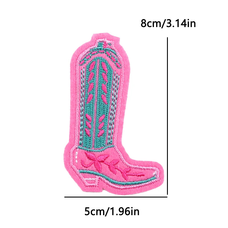 Pink cowboy boot patch with teal details and measurements on a white background