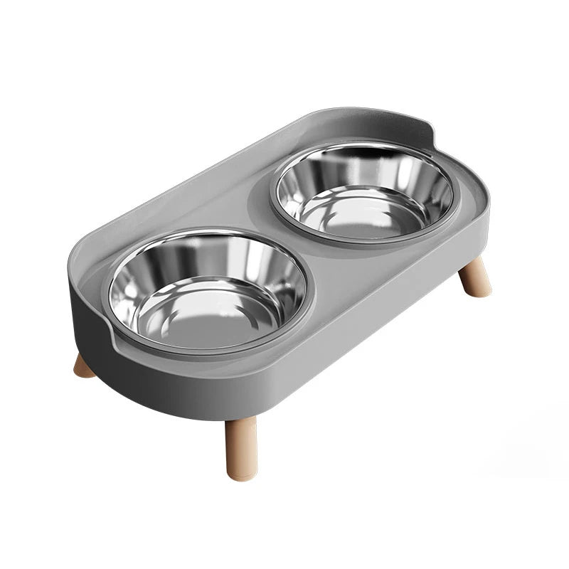 Pet food bowl stand with two stainless steel bowls on a white background