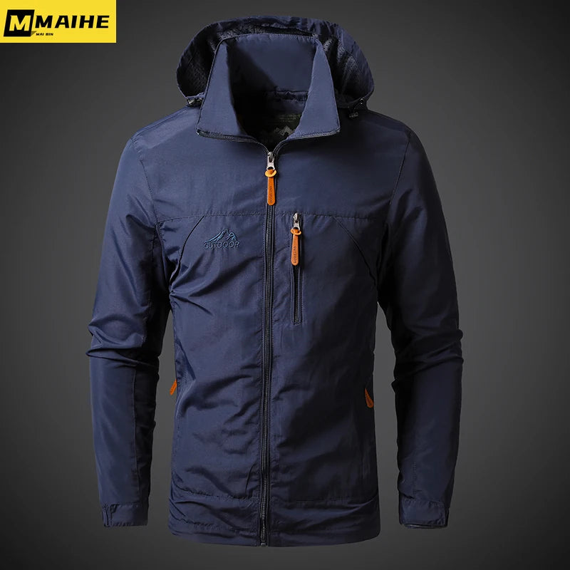Blue jacket with orange zippers on a dark background, featuring the MAIHE brand.