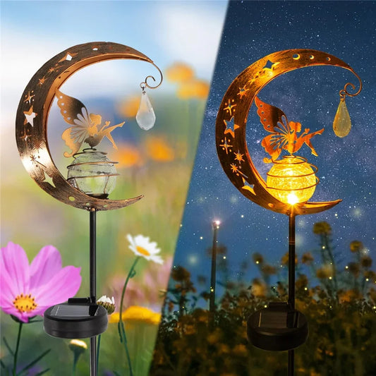 Solar garden light with moon and fairy design in daytime and nighttime settings.