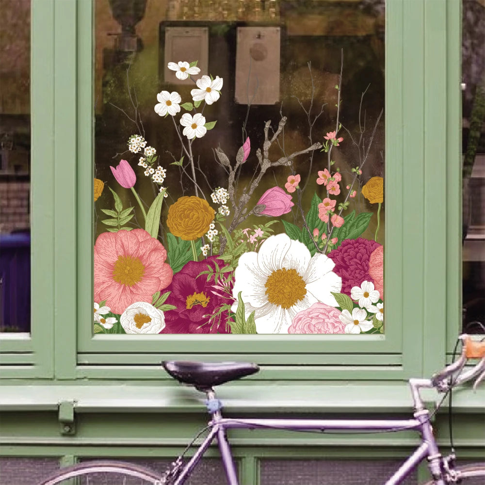floral window cling sticker on glass showing colourful stained glass effect with flowers and sunlight