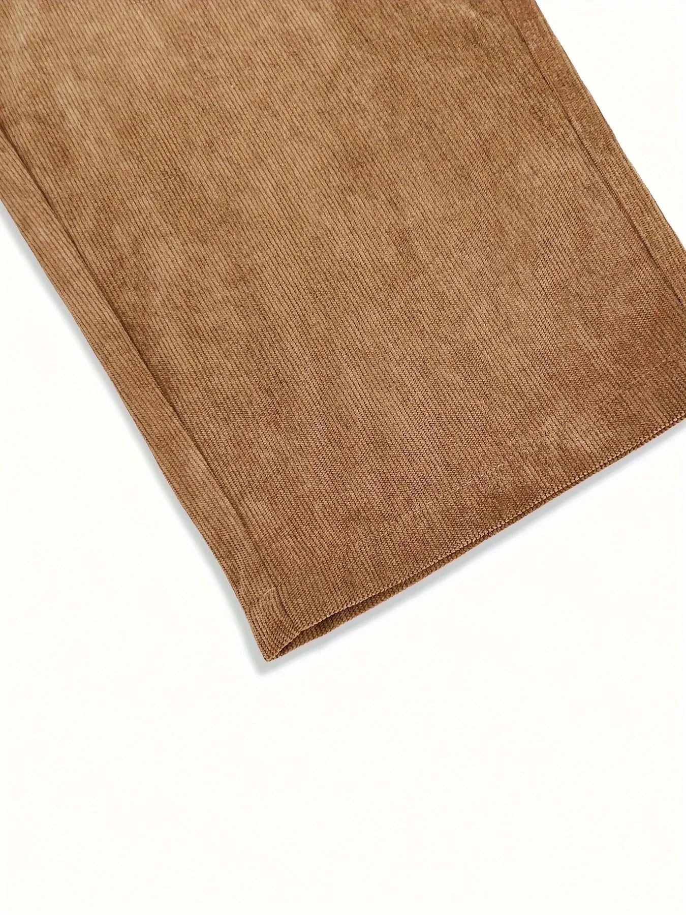 Close-up of brown fabric on a white background