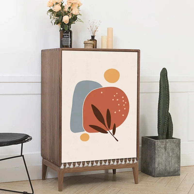 Multiple boho-style self-adhesive cabinet door curtains with abstract sun, moon, rainbow and geometric patterns on wooden cupboards