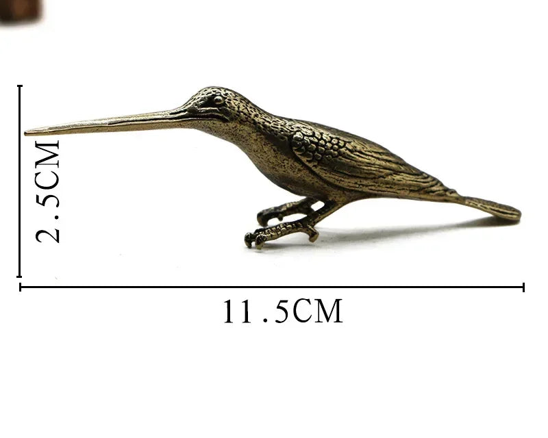Bronze bird figurine with measurements and weight displayed on a white background