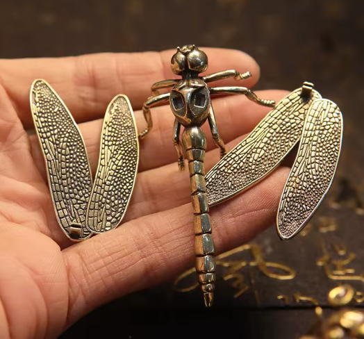 vintage brass dragonfly figurine showing parts to assemble